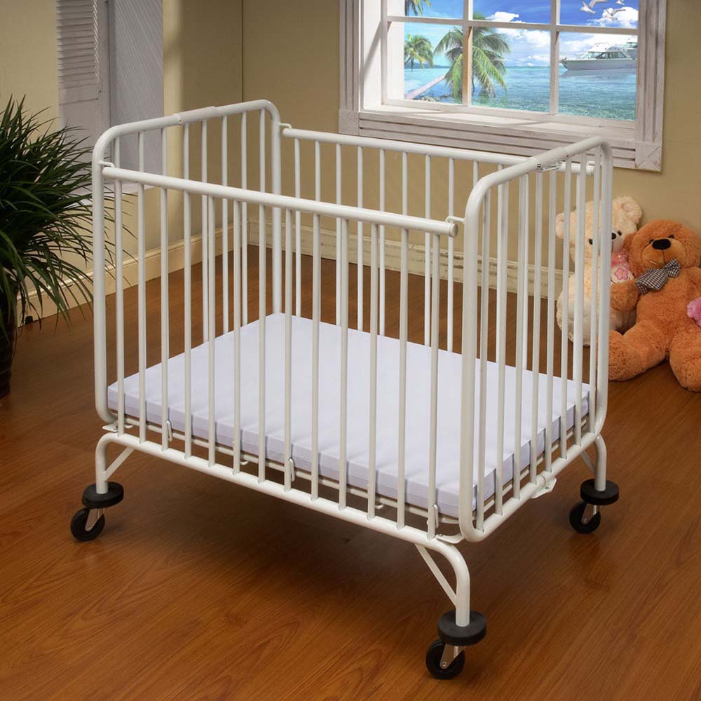 Stella Portable Crib + Mattress TAF Furniture